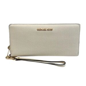 Jet Set Travel Leather Continental Wristlet in Light Cream | MICHAEL KORS